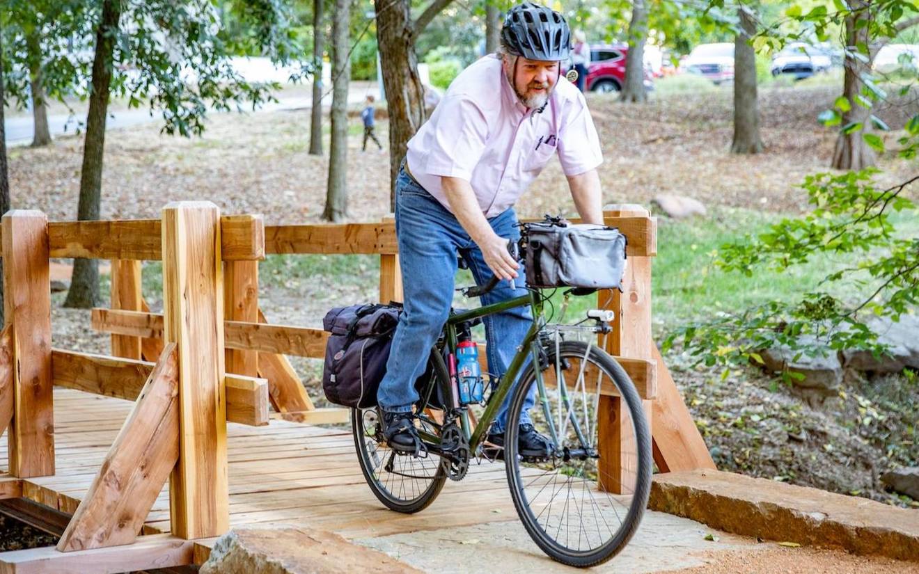 Photograph of cyclist on the trail